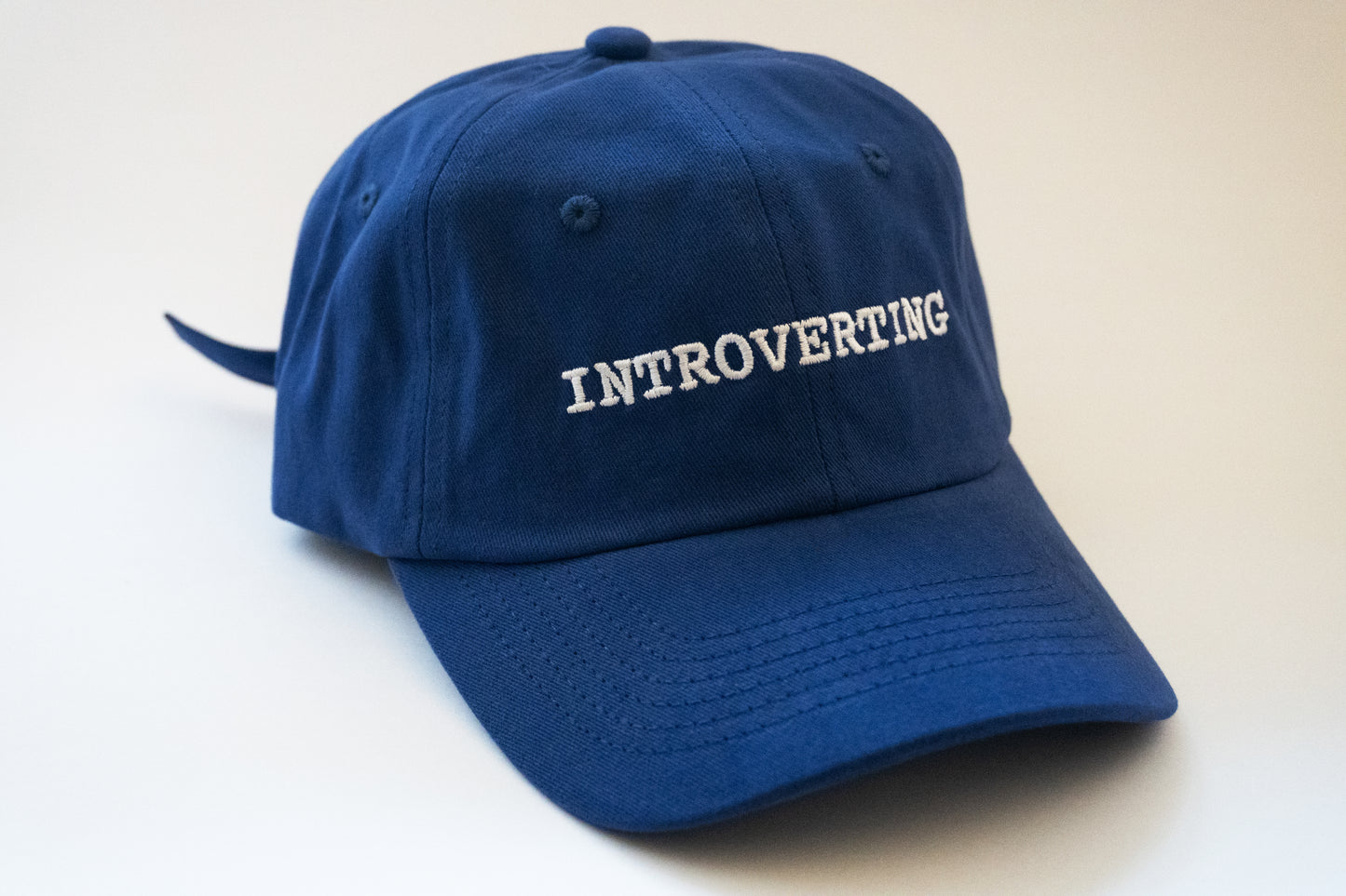 Introverting Cap